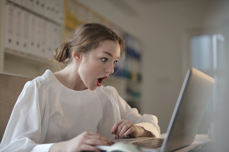 Stock image of surprised young woman 